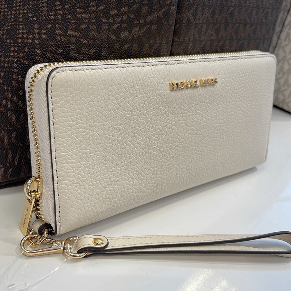 MICHAEL KORS
Leather Continental Wristlet Phone Case Wallet 
Light Cream 
NWT